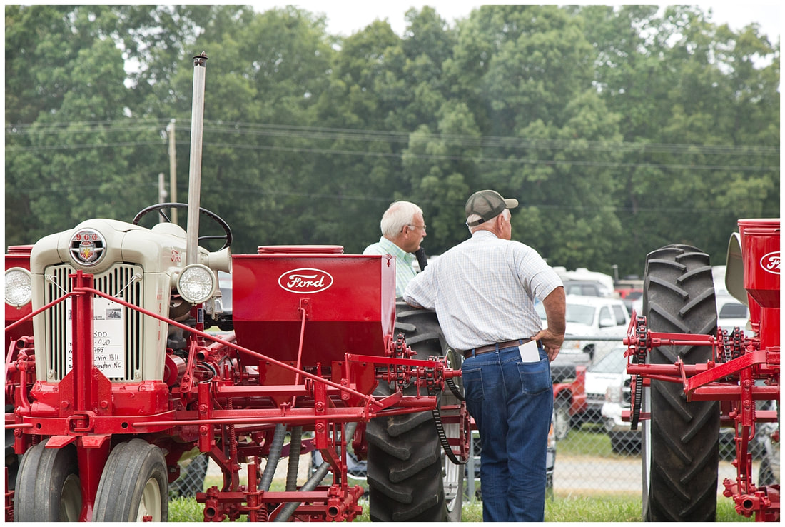 Tractor talk at the 2015 Southeast Old Thresher's Reunion in Denton, NC | Photographed by Nicole Watford Photography