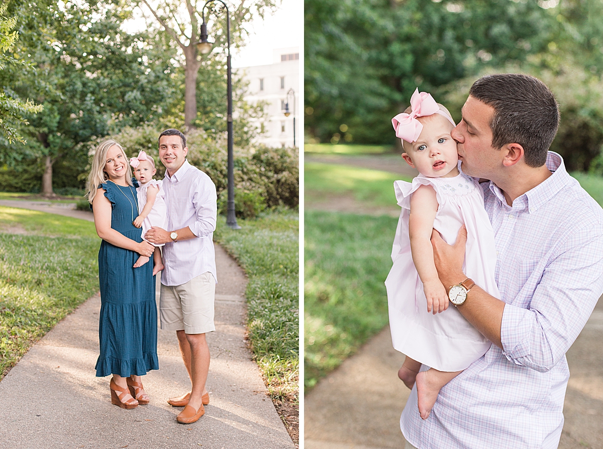 Parents hold their one-year old girl during family portraits in Columbia SC