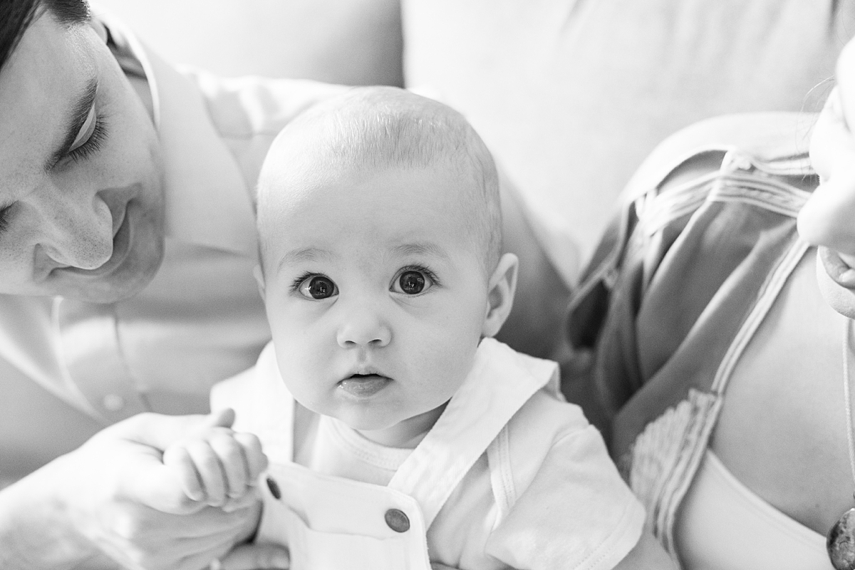 baby boy looks at camera during in-home session