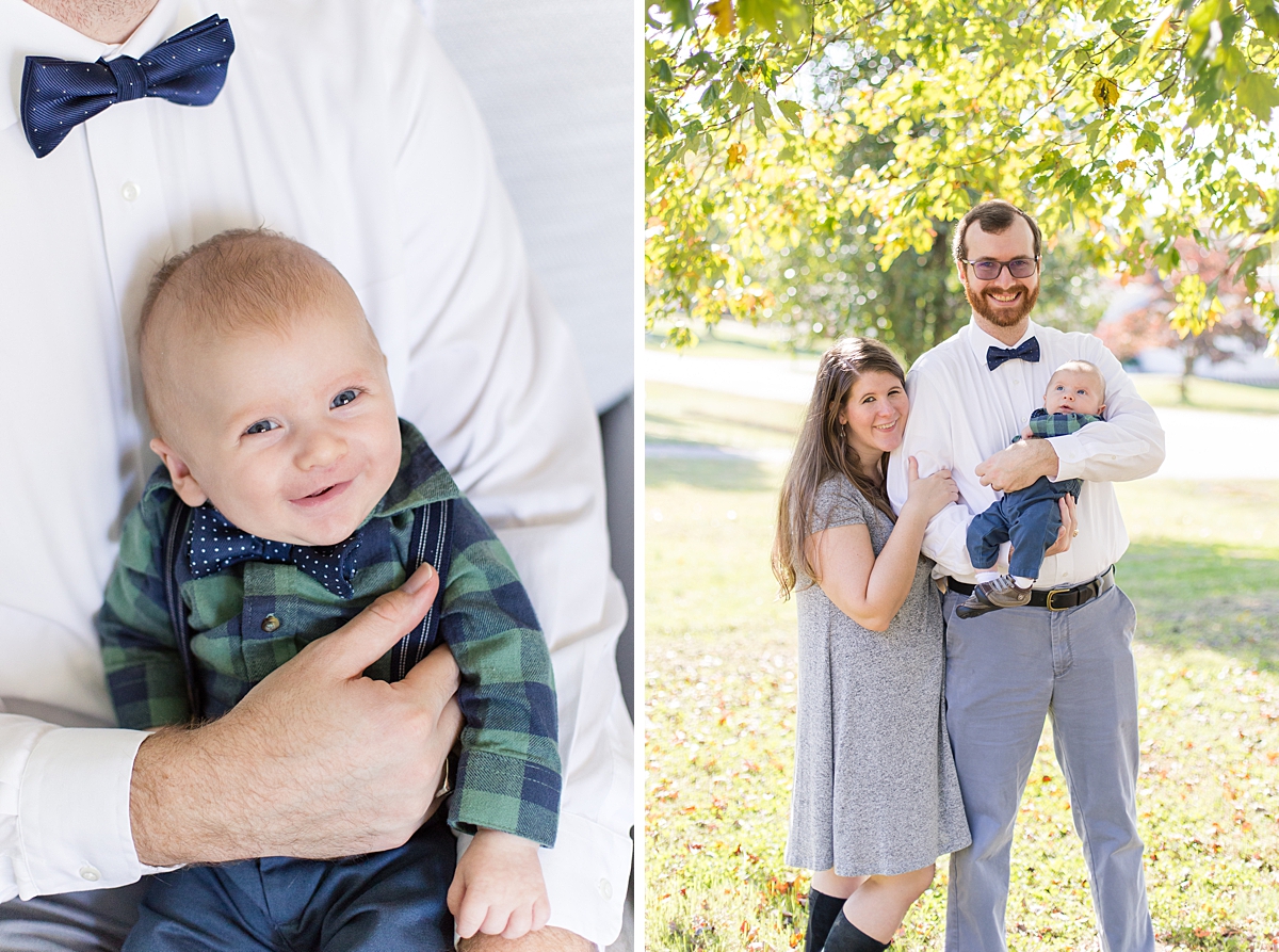 parents hold their son in plaid shirt during in-home cozy lifestyle newborn session