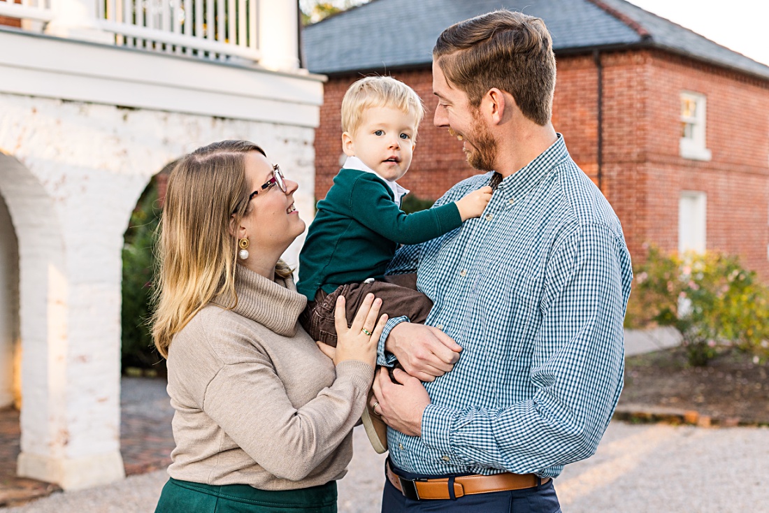 family of three with toddler boy during fall mini session event with Nicole Watford Photography in Columbia, SC