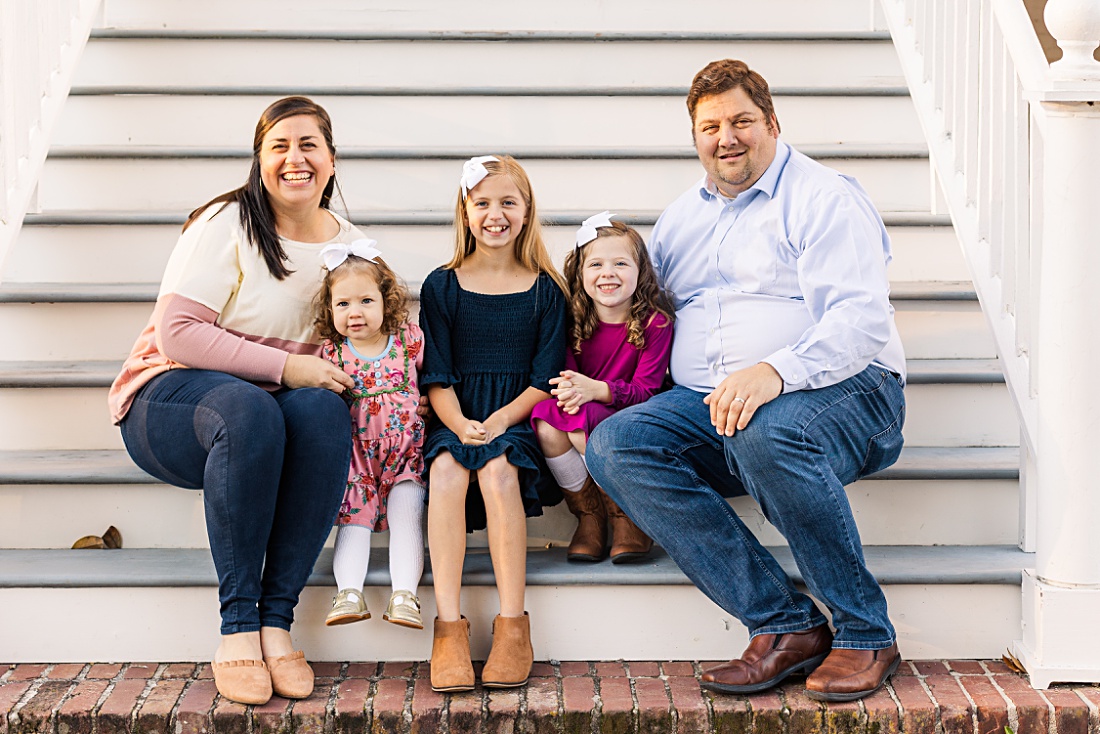 coordinating family of five smiling during in family photo during their mini session with Nicole Watford Photography in Columbia, SC